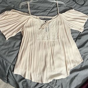 Cream colored cold-shoulder top